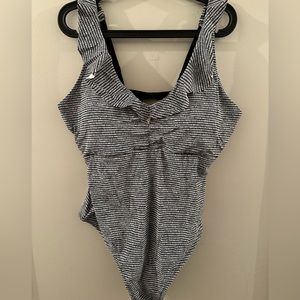 White and navy one piece